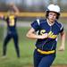 A Saline player rounds third in the game against Chelsea on Monday, April 29. Daniel Brenner I AnnArbor.com